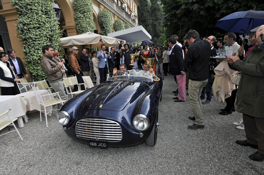 The Clive Beecham Ferrari 166MM takes as the example of beauty . The Class E Gentlemens racers - Speed meets post-war style holds the Coppa d'Oro trofeo.